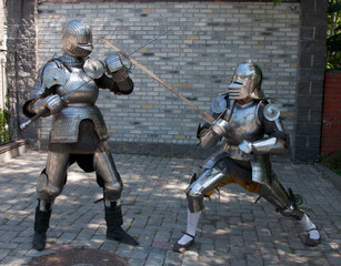 two knights in the ancient metal armor