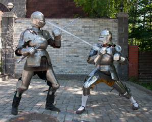 two knights in the ancient metal armor