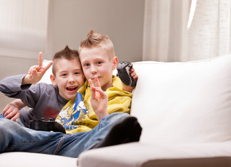 Fototapeta premium two kids playing video games