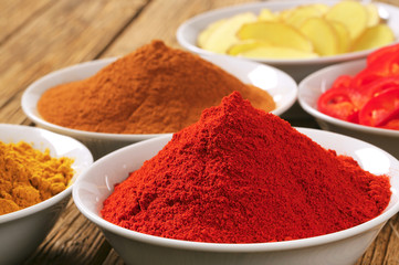 Curry powder, paprika,  ground cinnamon, sliced ginger root and