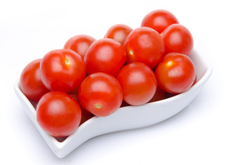 Tomatoes in a white cut