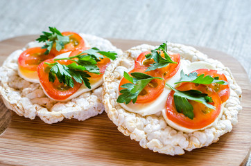 Gluten-free sandwiches with mozzarella and tomatoes