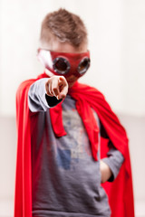 red cloak  kid livingroom superhero
