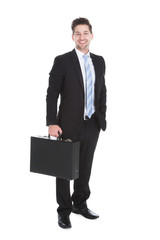 Businessman With Suitcase Over White Background