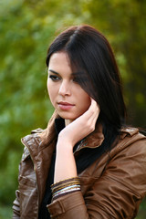Beautiful women thinking in loneliness in city park.