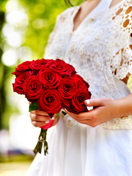 Bride with rose bouquet