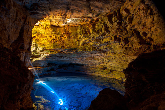 Enchanted Cave in Brazil with Sun Rays reflecting on the water