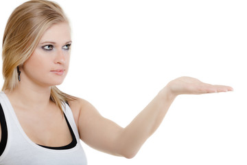 Blonde girl blowing a kiss or with copy space on hand