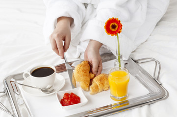 Breakfast in bed in hotel room.