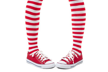 Young girl wearing striped red socks