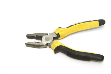 old pliers yellow and black color