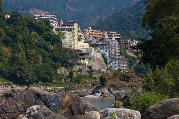 Fototapeta na wymiar Holy Ganges river that flows through Rishikesh, India.