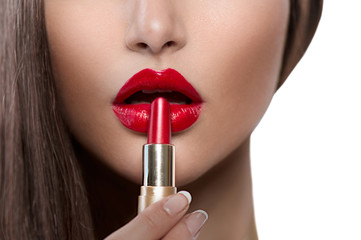 Beauty Girl Applying Lipstick. Professional Makeup