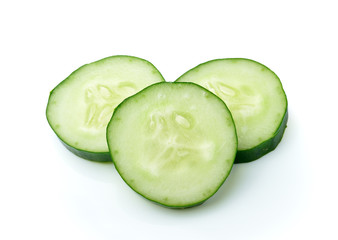 Cucumber and slices isolated over white background