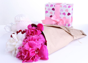 Beautiful peonies and gift boxes, isolated on white
