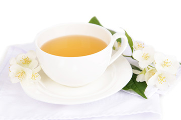 Cup of tea with jasmine isolated on white