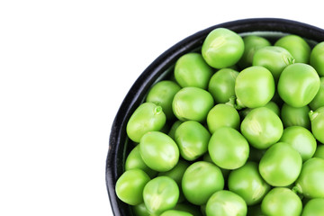 Fresh green peas in mug isolated on white background