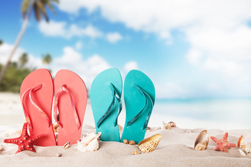 Summer beach with colored sandals