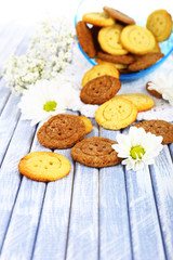 Sugar cookies in shape of buttons on table