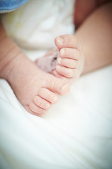 Fototapeta na wymiar Feet of newborn