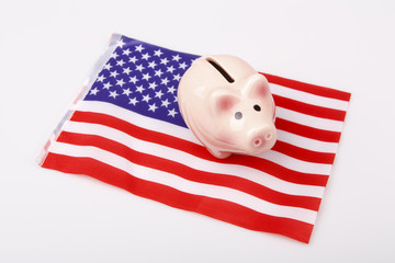 pig money box and USA flag