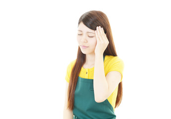 頭痛を訴える女性