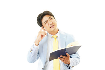 頭痛を訴えるビジネスマン