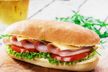 ham sandwich with cheese and tomatoes