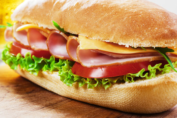 ham sandwich with cheese and tomatoes