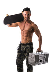 Shirtless muscular man with skateboard and boombox radio
