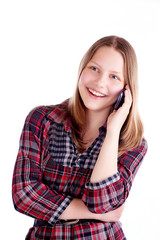 Teen girl laughing and talking on the phone