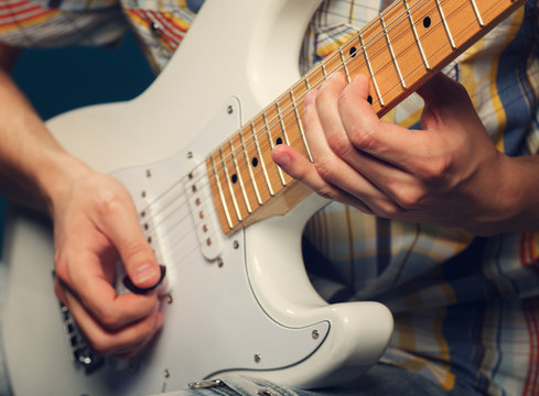 Guitarist playing an electric guitar