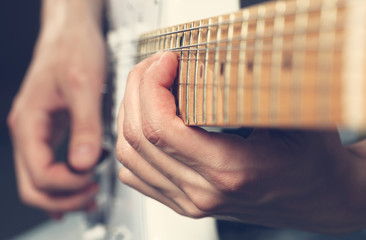 Guitarist playing an electric guitar