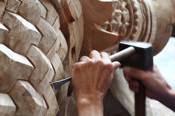 Craftsman carving wood - 66258039