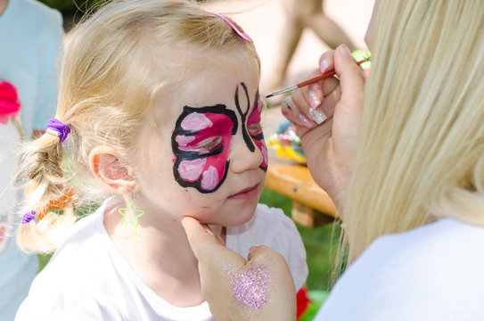 child with face painting