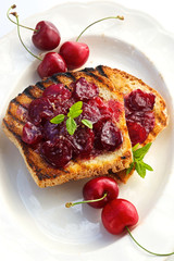 Delicious toast with homemade cherry jam