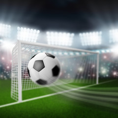 soccer ball flies into the goal