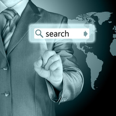 Businessman pushing virtual search bar