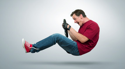 Funny man car driver with a wheel, auto concept