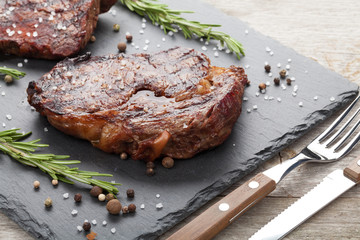 Beef steaks with rosemary and spices