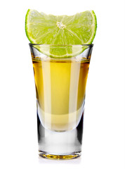 Gold tequila shot with lime isolated on white - obrazy, fototapety, plakaty