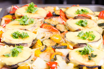 Baked mushrooms with cheese and parsley with vegetables