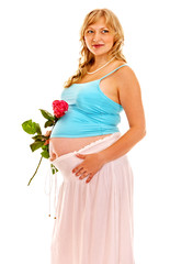 Pregnant woman with flower.