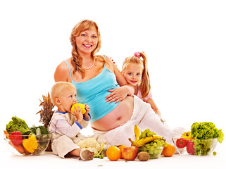 Family pregnant woman preparing food .