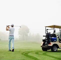 Photo sur Plexiglas Golf golf cart man