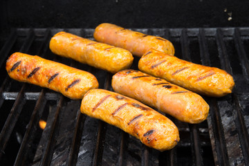 italian sausages on grill