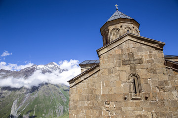 Fototapeta premium Gergeti Trinity Church in Stepantsminda Georgia