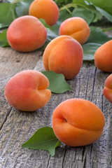 Healthy organic apricots on old rustic table