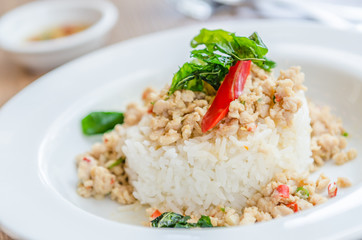 Spicy fried chicken with basil and rice