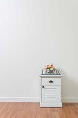 Love sign on bedside table